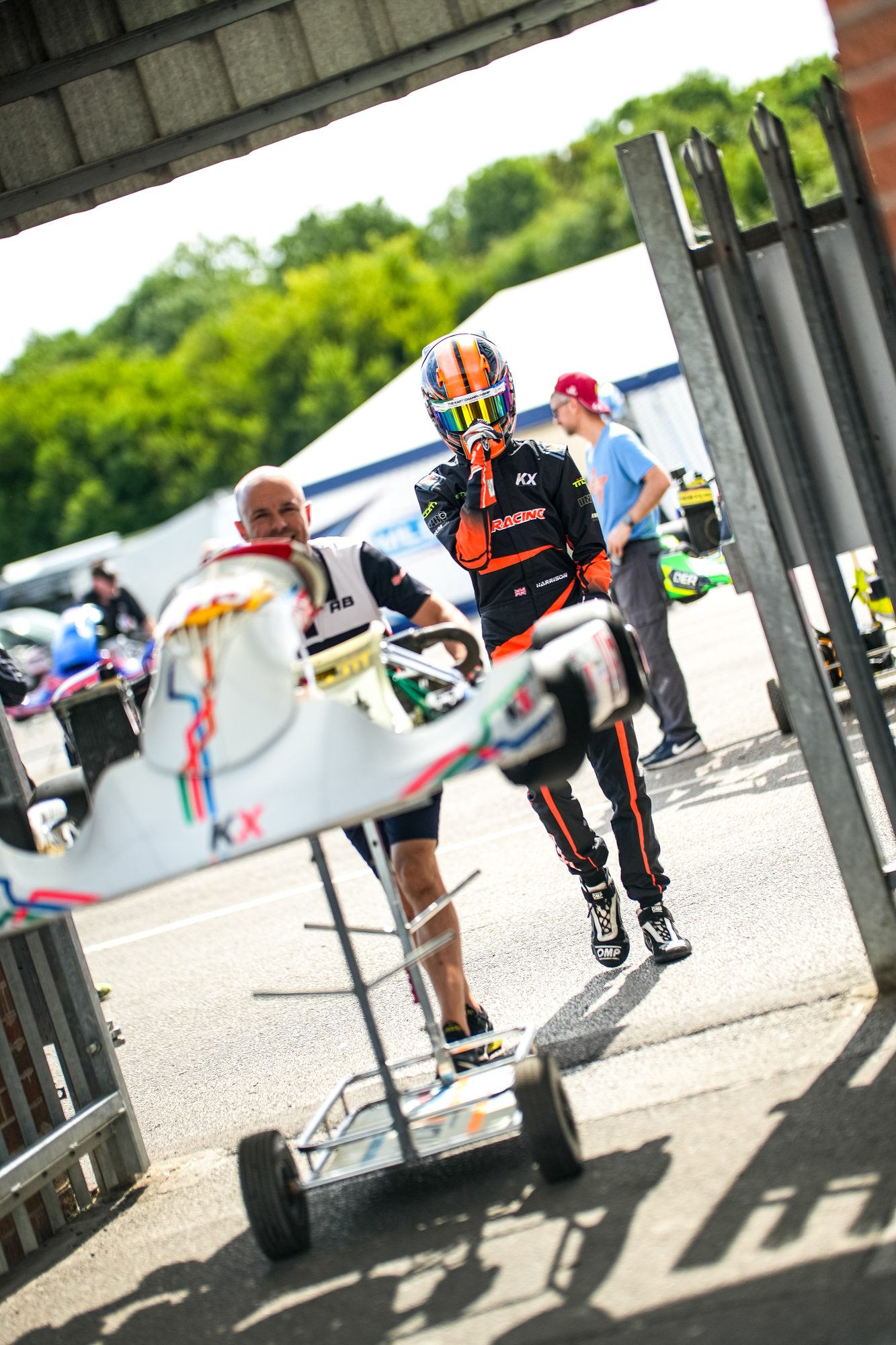 A driver in the paddock between sessions